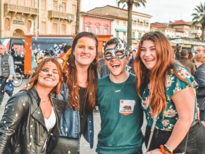 A group of happy students at a carnival.